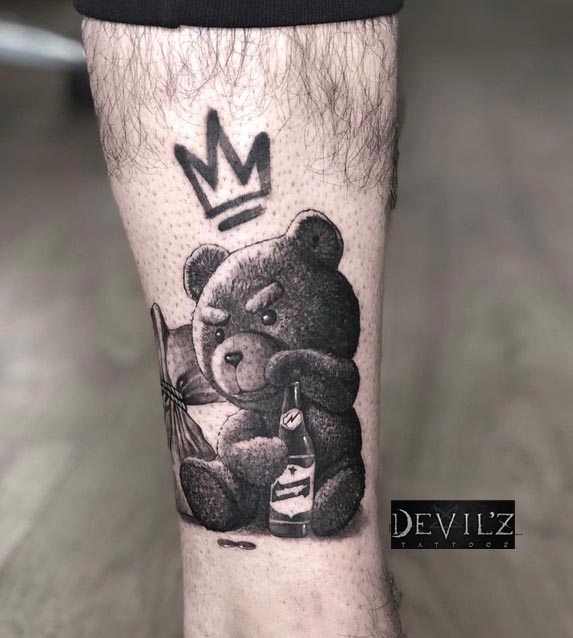 calf tattoo teddy bear tattoo