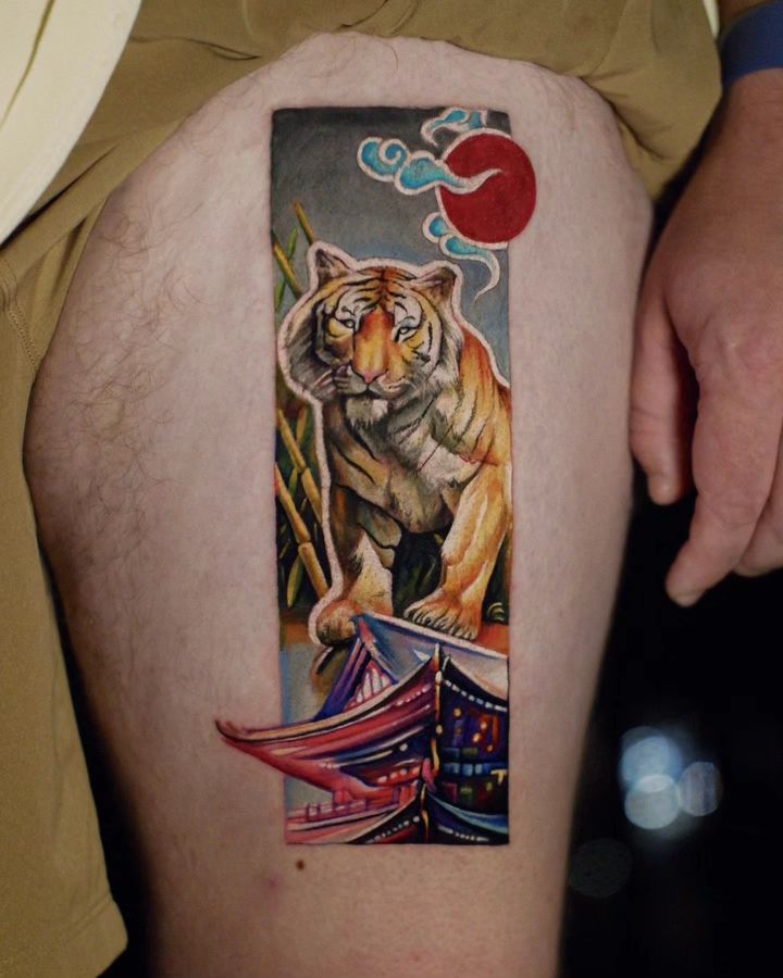 thigh lion tattoo