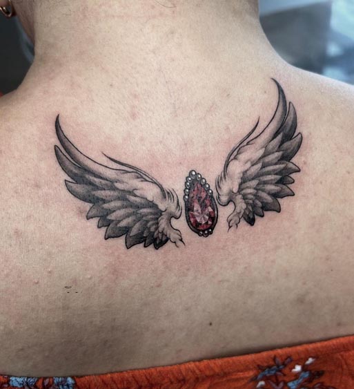 2 angel wings ruby gemstone tattoo design female nape