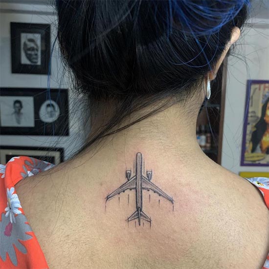 small airplane easy tattoo design black and grey woman nape