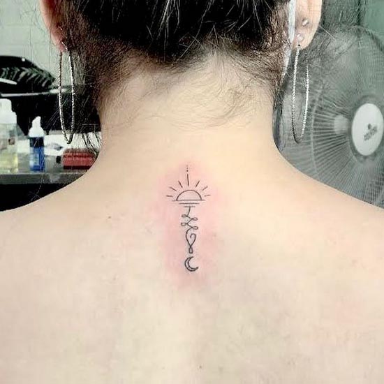 small unalome simple tattoo design female nape