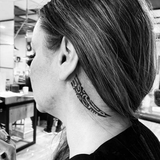 blackwork tribal maori simple tattoo design woman back ear neck