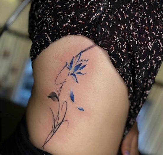 blue flower japanese best tattoo female lower ribcage