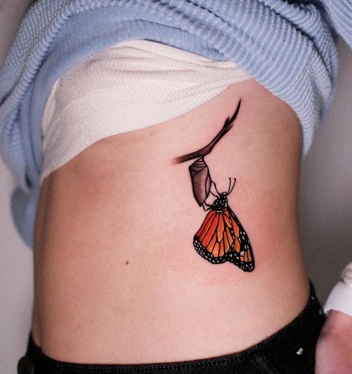 butterfly with cocoon cute tattoo design female side rib