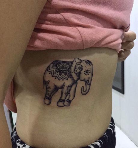 elephant tattoo black and grey female ribcage