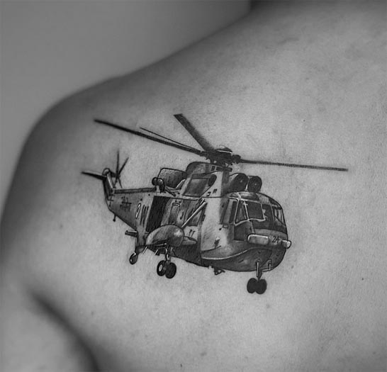 helicopter tattoo black and grey man shoulder blade