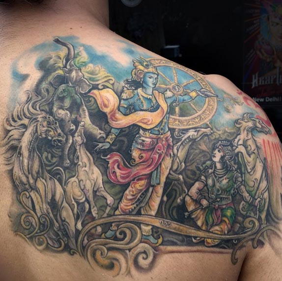 krishna and arjun from mahabharat indian religious tattoo man back shoulder