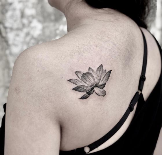 lotus small tattoo design girl back shoulder blade