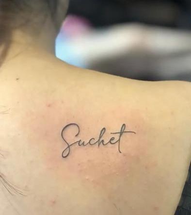 name suchet tattoo idea female back shoulder