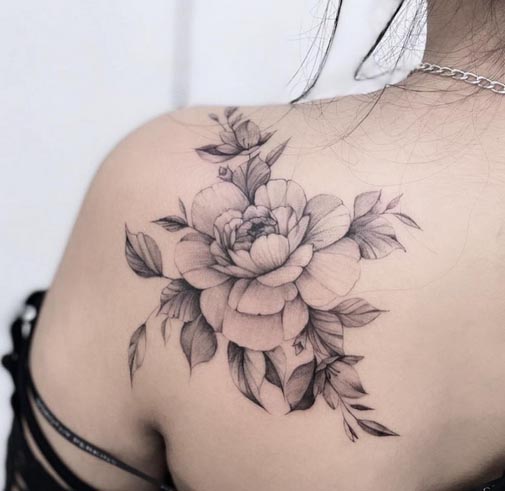 peony flower tattoo black and grey female shoulder blade