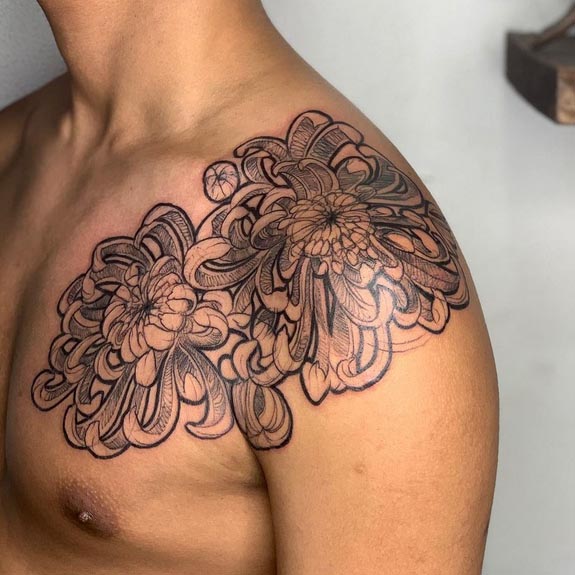 chrysanthemum tattoo blackwork male shoulder chest