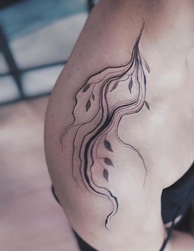 cool liquid flow with leaves tattoo design female right shoulder