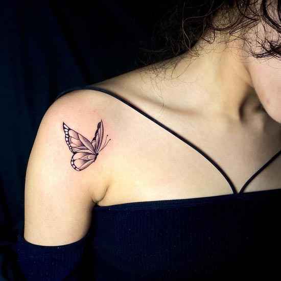 delicate butterfly tattoo minimalist linework girl inner shoulder