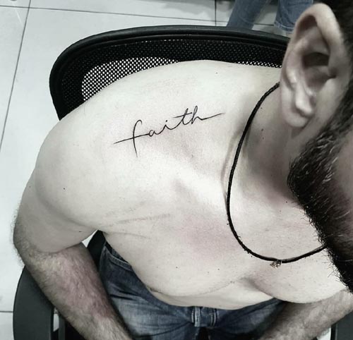 faith word tattoo design man upper right shoulder