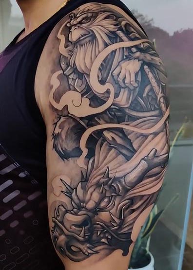 best monkey king sun wukong and dragon tattoo design male shoulder bicep