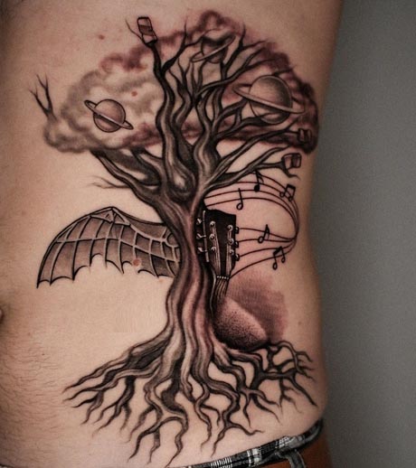 tree clouds guitar music notes bat wing big tattoo design lower male side