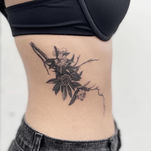 tree saptaparni blackboard branch leaves flowers tattoo female side