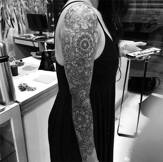 cool mehndi tattoo design girl full sleeve