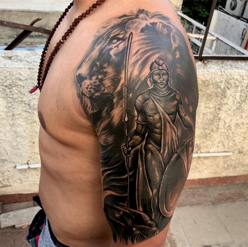 lion and native indian man tattoo half sleeve