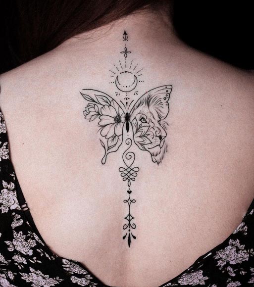 butterfly lioness flowers moon sun tattoo fine line female spine