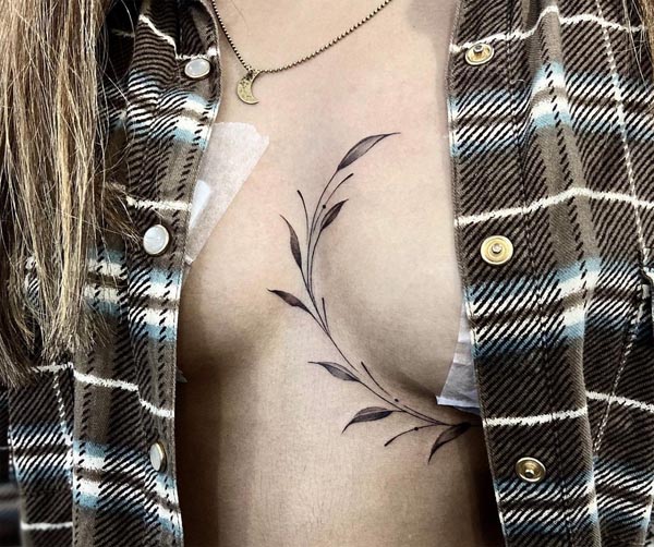 floral leaves minimalist tattoo design female sternum