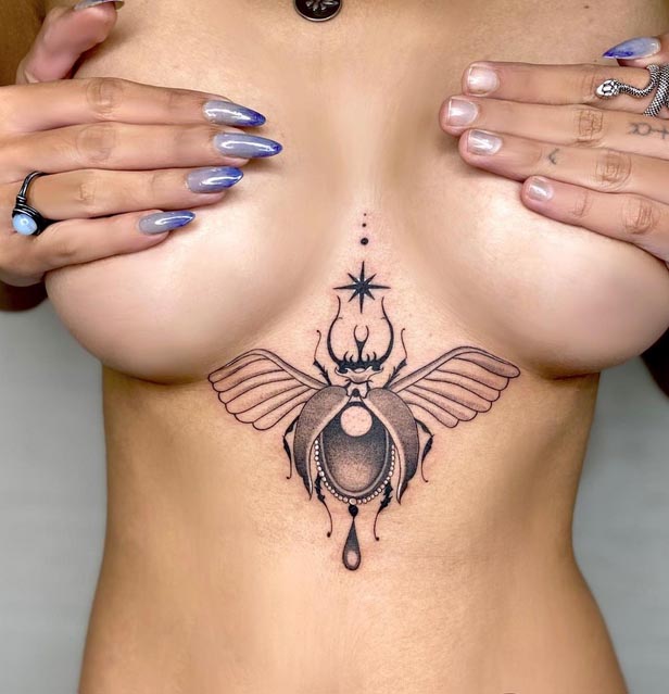 gothic moth tattoo sternum under boob whip shading