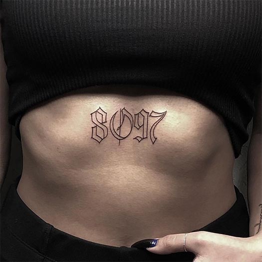 calligraphy number 8097 tattoo design woman upper stomach