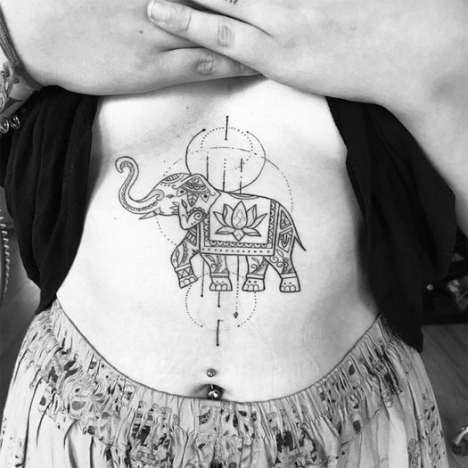 elephant linework simple tattoo design girl stomach