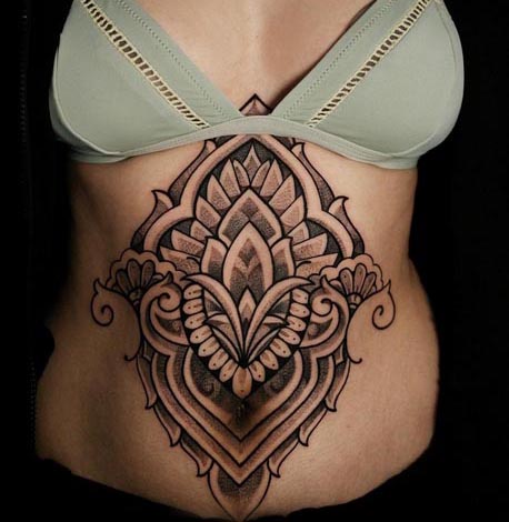 ornamental tattoo design woman full stomach