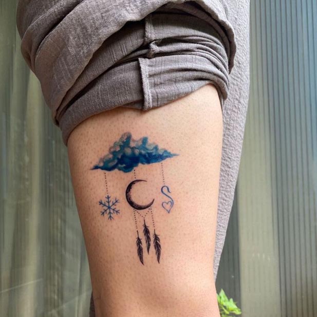 cloud dream catcher snowflake heart tattoo female outer thigh