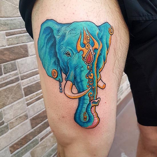 elephant trunk trishul on head unique tattoo design color blue man thigh