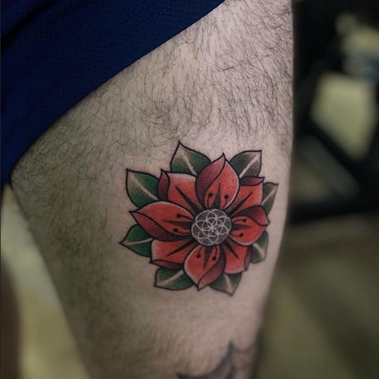 japanese cherry blossom flower green red tattoo male thigh