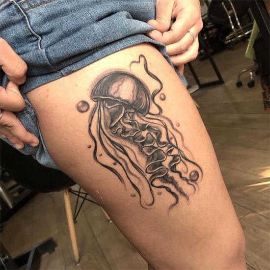 jellyfish tattoo design girl outer thigh black and grey