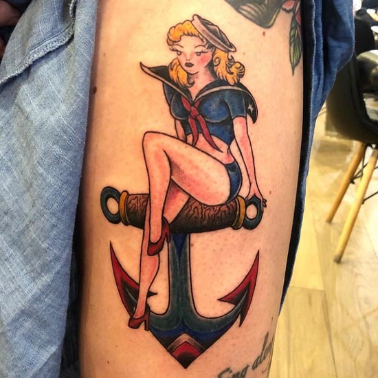 pinup girl color tattoo old school female thigh