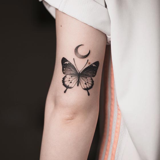 butterfly crescent moon tattoo design girl lower tricep