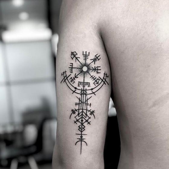 viking warrior symbol tattoo design linework male tricep