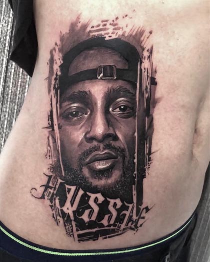 nipsey hussle portrait tattoo design male side waist