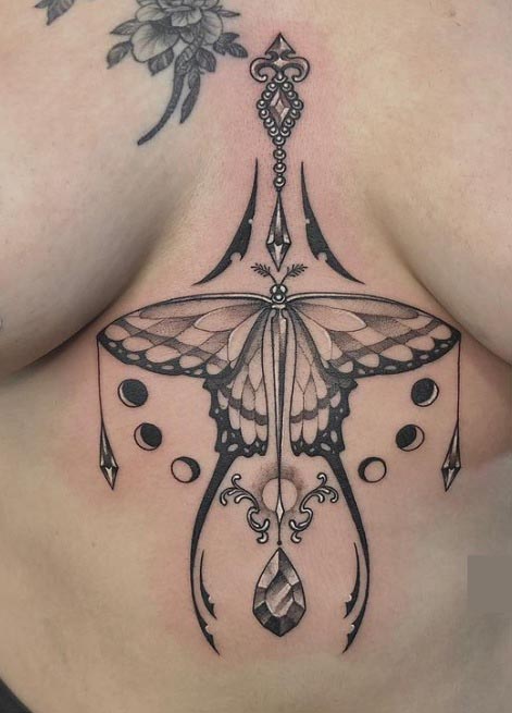 breast butterfly tattoo