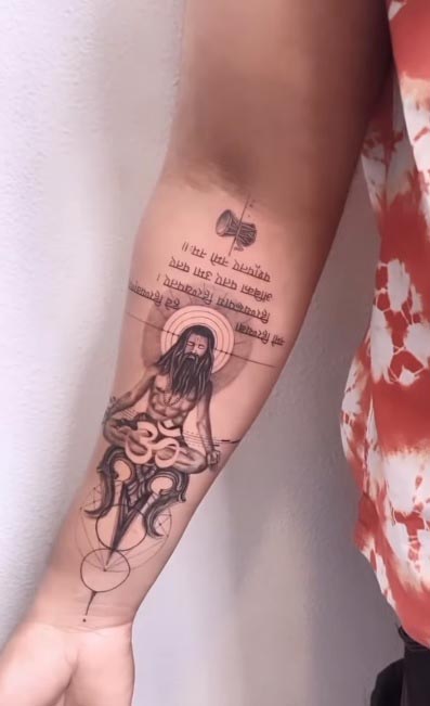 forearm aghori tattoo