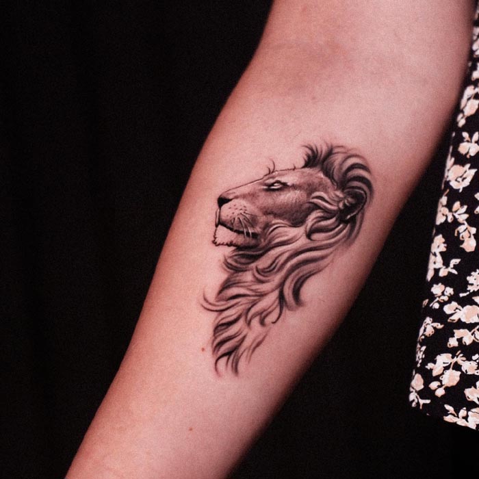 forearm lion tattoo