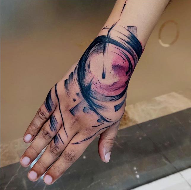 hand abstract art tattoo