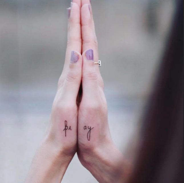 hand pray text tattoo