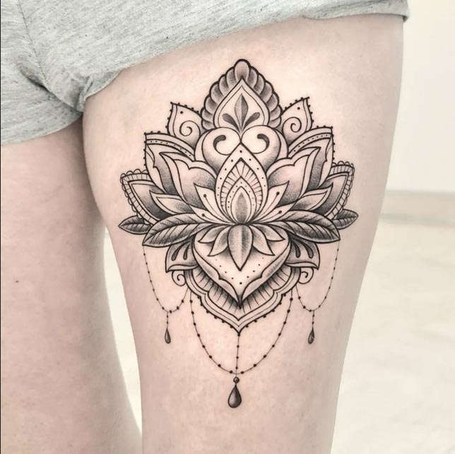 thigh tattoo mandala art