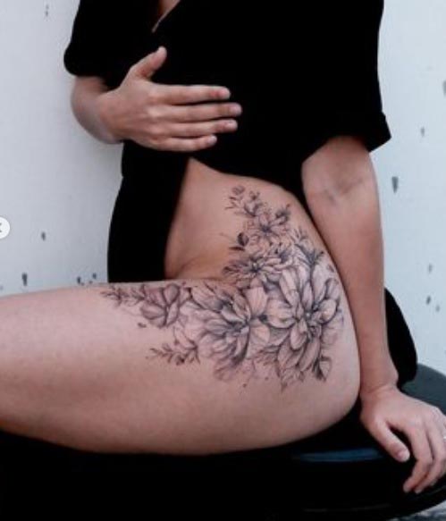 waist pelvic area floral tattoo design