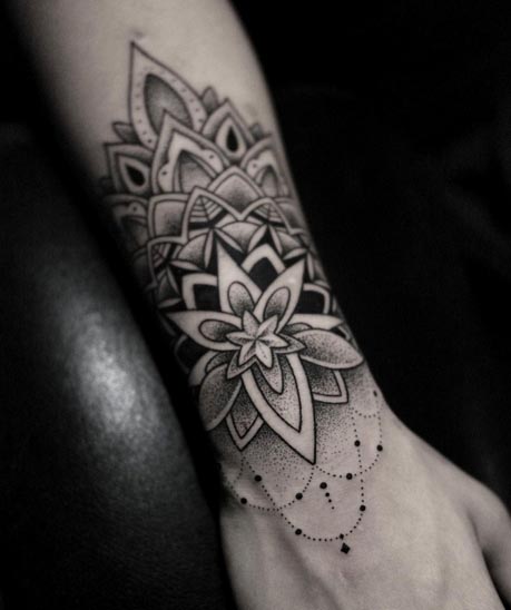 big mandala tattoo top of wrist men ornamental dotwork