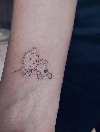 cute cartoon tintin tattoo design female inner wrist