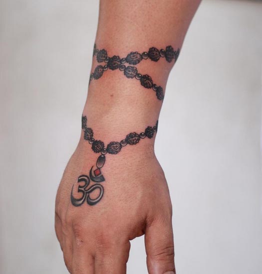 rudraksha rosary beads band with om tattoo design male wrist hand